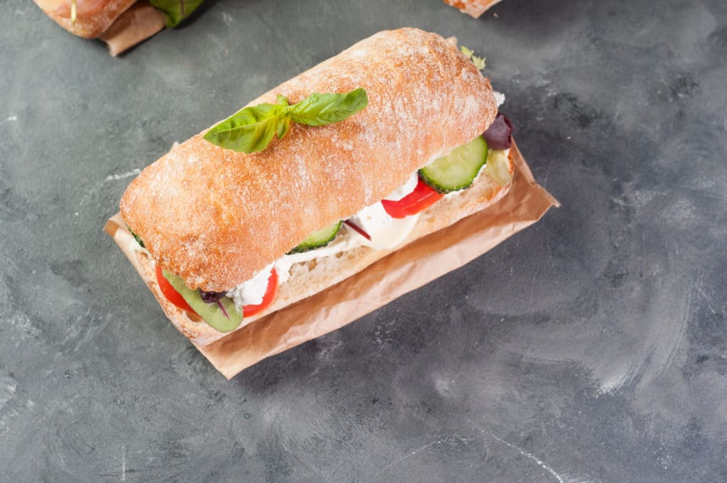 sandwich made on artisan ciabatta bread